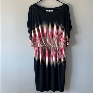 Black dress with bold middle torso print. Size 12